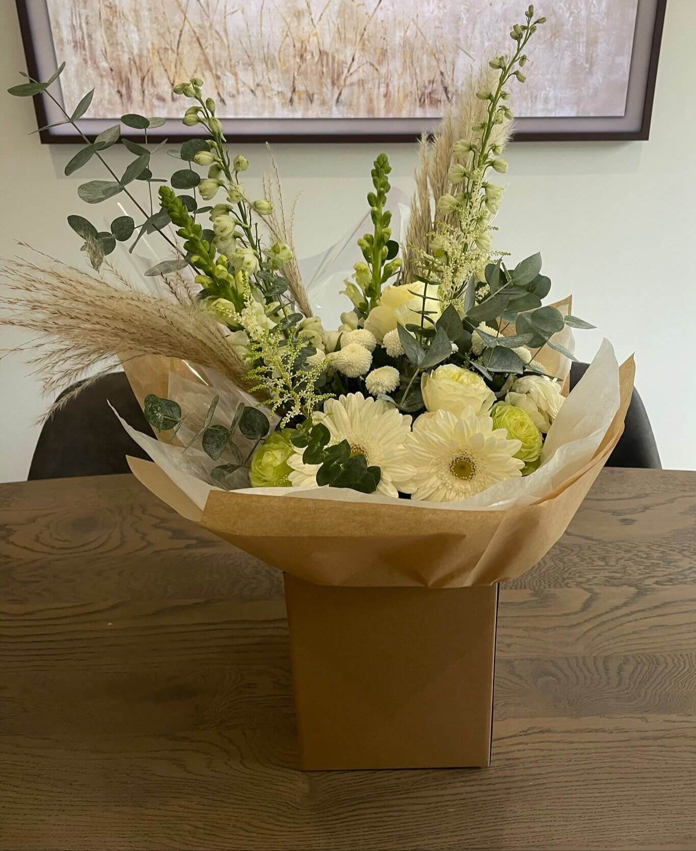 Embrace the understated beauty of nature with our neutral hand-tied flower bouquet