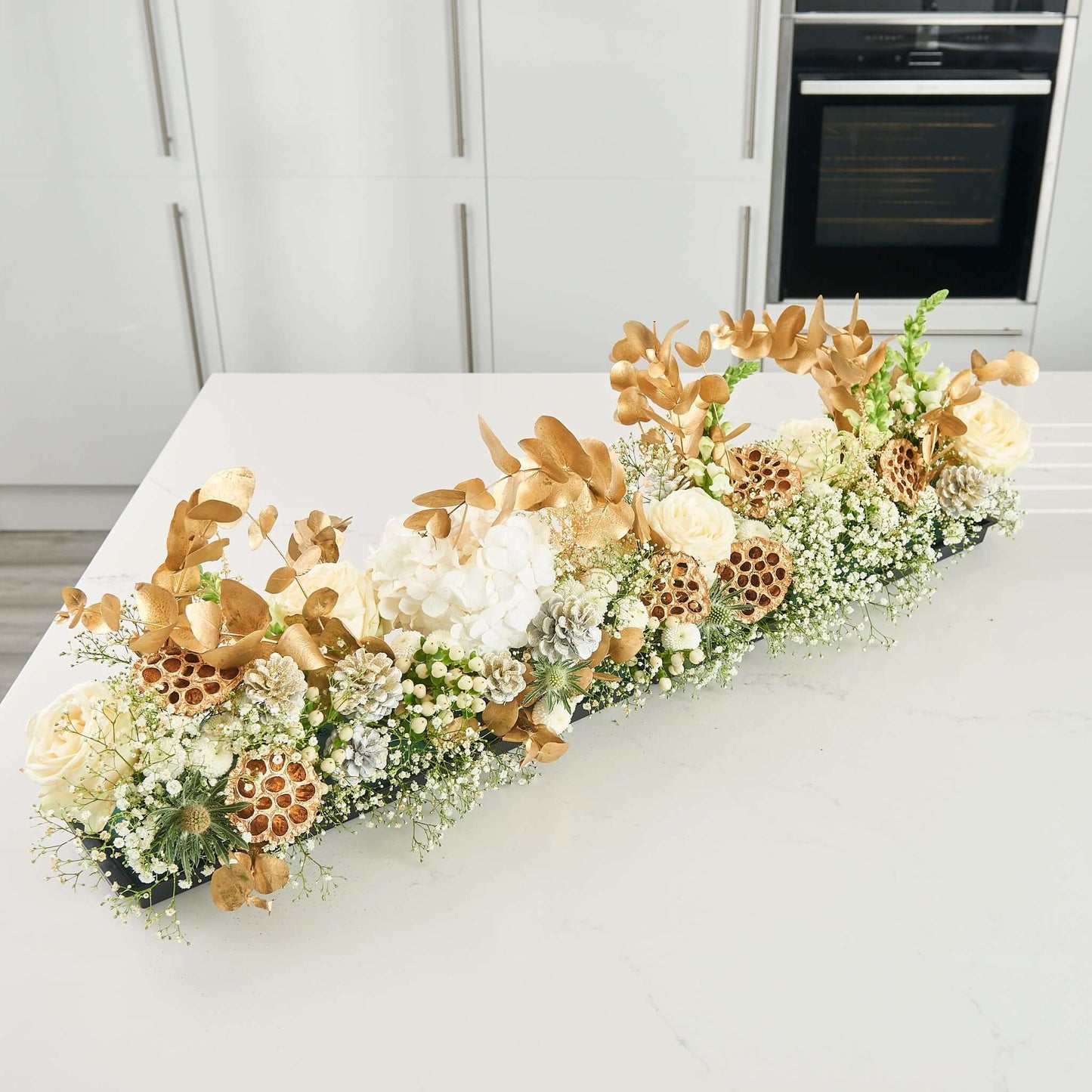 Transform your tablescape into a festive winter panorama with our Golden Glacier Runner