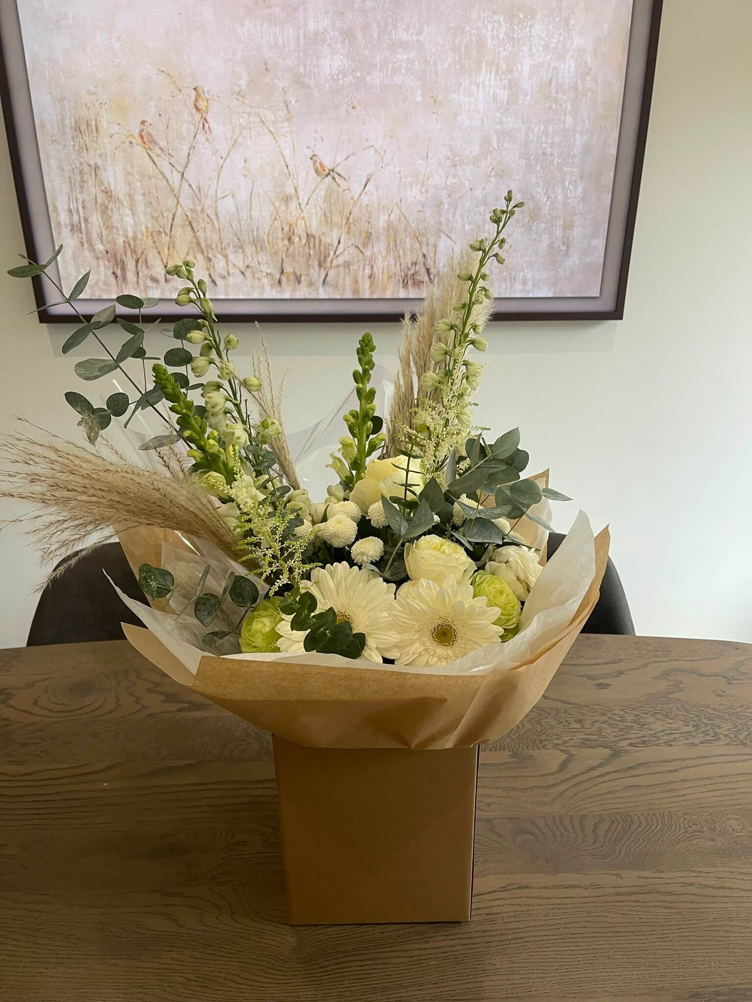 Embrace the understated beauty of nature with our neutral hand-tied flower bouquet