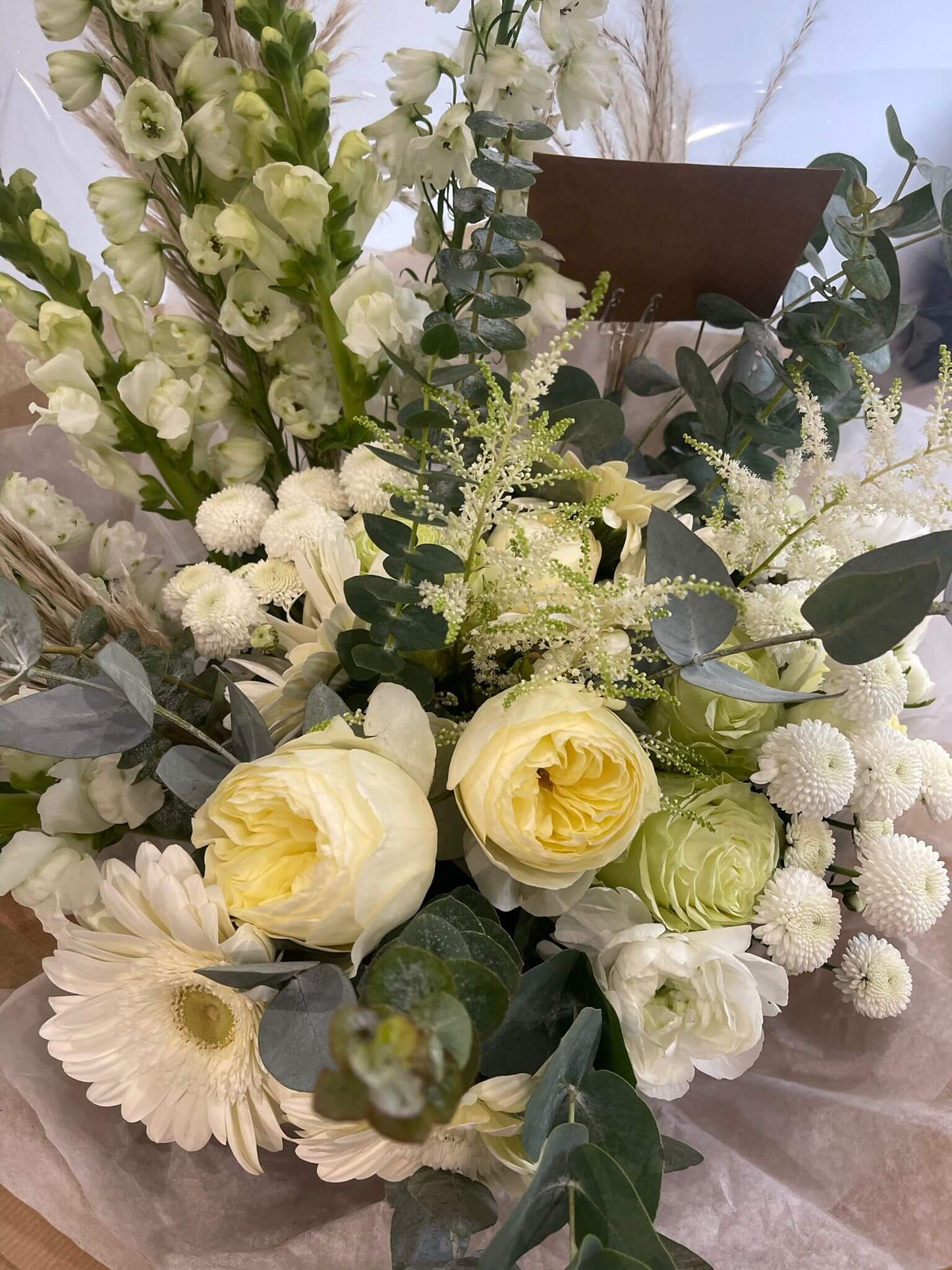 Embrace the understated beauty of nature with our neutral hand-tied flower bouquet